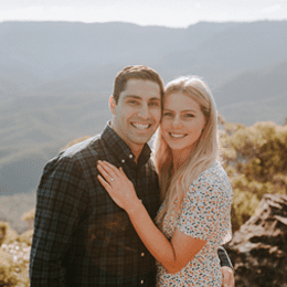 Couple hugging after a marriage proposal in the Blue Mountains